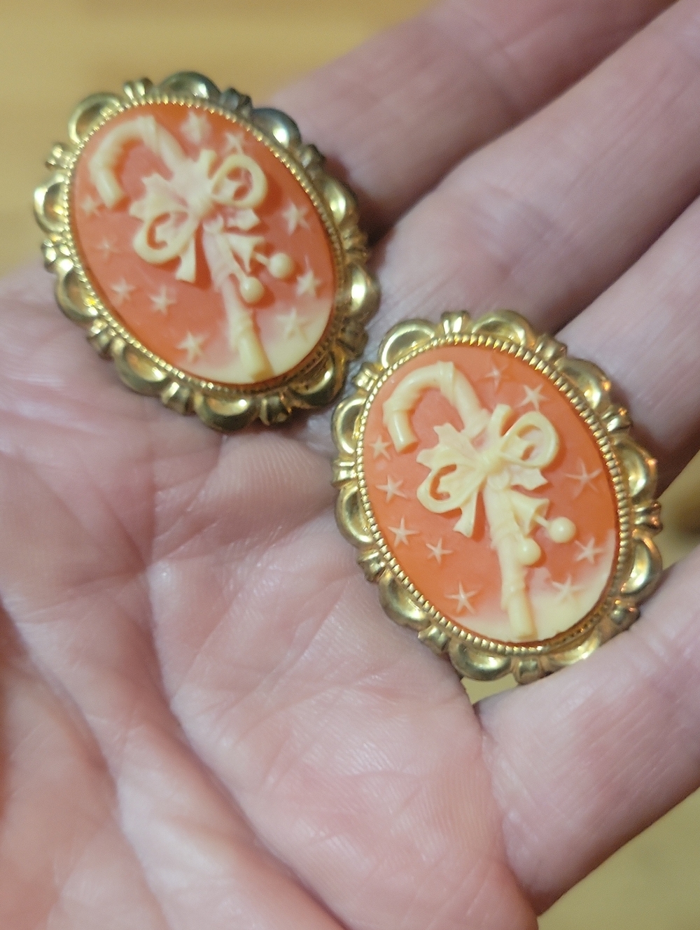 Gold-Tone Orange Cameo Clip on Earrings with Bow Motif